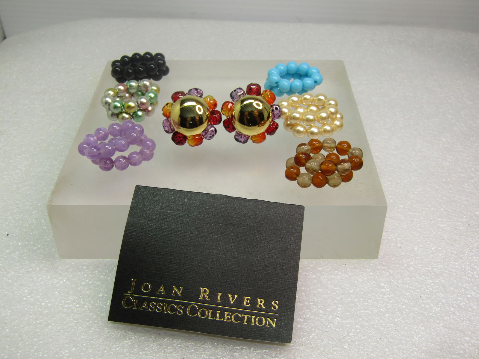 Vintage Joan Rivers Beaded Interchangeable Enhancer Earrings, Pierced. 1990's: Vintage Joan Rivers Beaded Interchangeable Enhancer Earrings, Pierced. 1990's. Gold tone 14mm rounded dome center to the pierced earrings with a recessed area beneath where you can slip on one of the