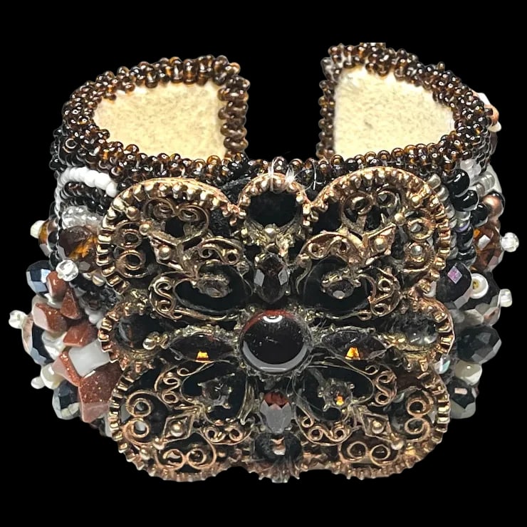 Vintage Handmade Artisan Beaded Bracelet/Cuff: Title: Vintage Handmade Artisan Beaded Bracelet/Cuff Description: Vintage Handmade Artisan Beaded Bracelet/CuffWeighs 96 gramsOne Size/ Can be adjusted/ Approx. 7 inch inner circumferenceGood Conditio