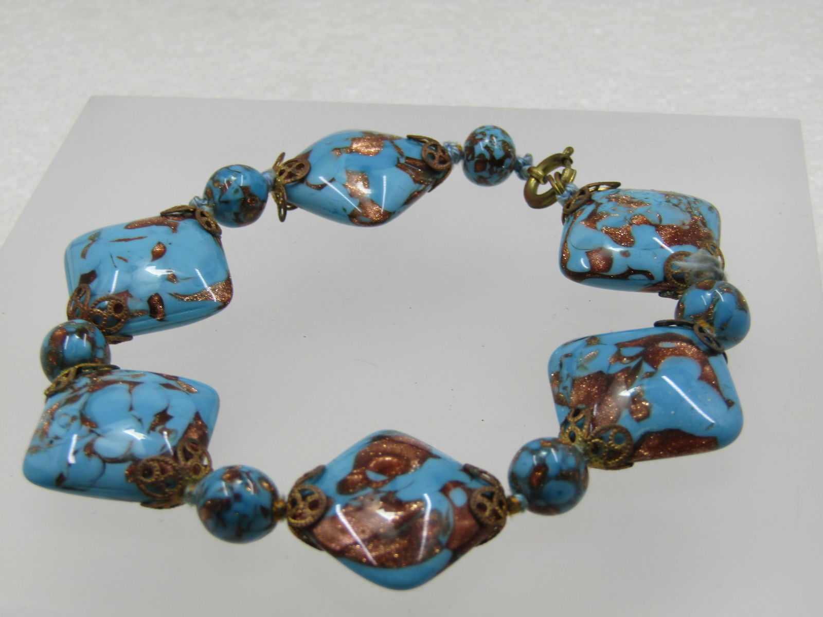 Vintage Murano Art Glass Square Beaded Bracelet, 1930's, 8.5",: Vintage Murano Art Glass - Turquoise and Copper Glitter Square Beaded Bracelet, 1930's, 8.5", with six puffy square turquoise blue glass beads with coppery glitter veins runnings through them. 