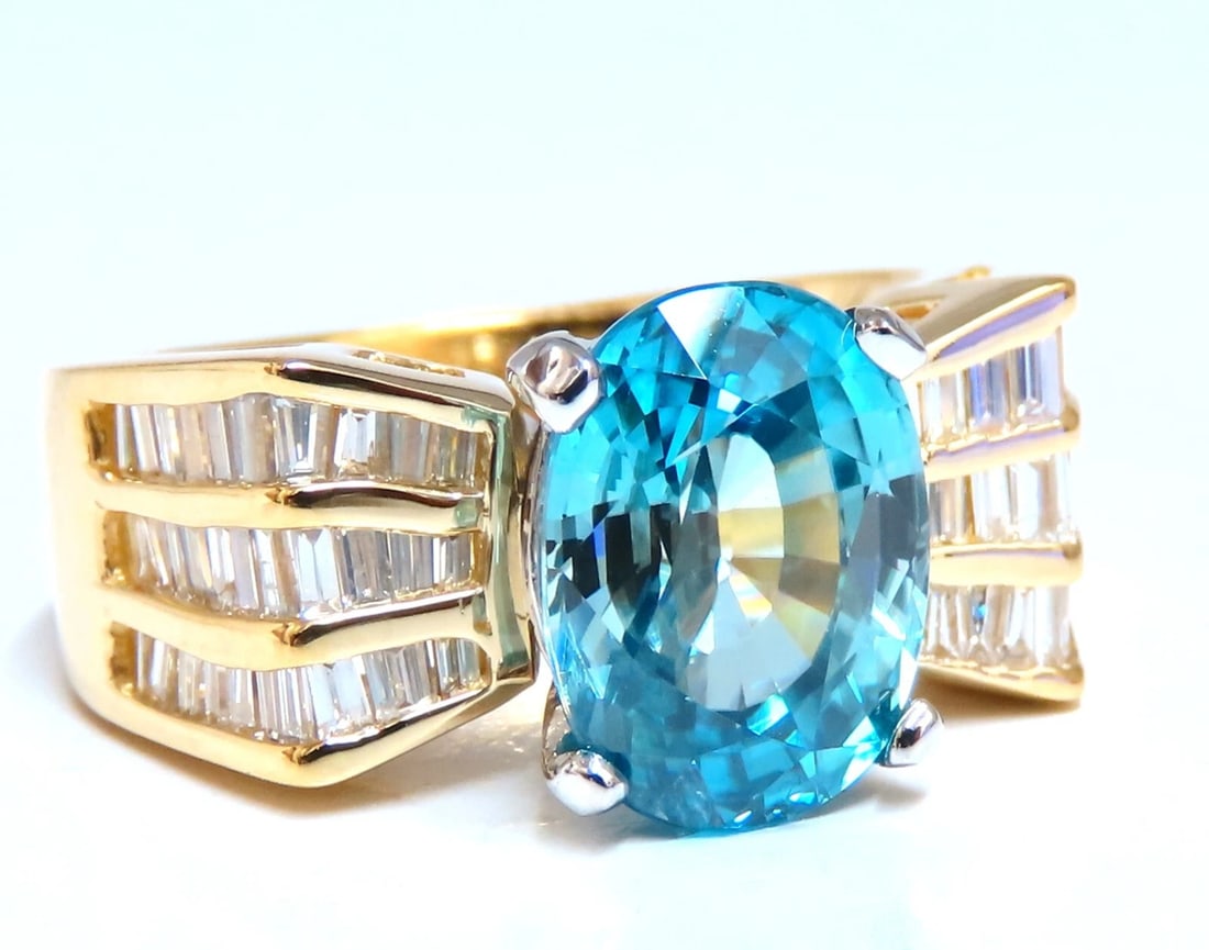 5.36 carat natural blue zircon baguette diamond ring 14kt gold**: Title: 5.36 carat natural blue zircon baguette diamond ring 14kt gold** Description: Natural blue zircon diamond ring 5.36ct oval blue zircon 11x8.2 mm Oval cut, clean clarity, transparent. 1.20 carat