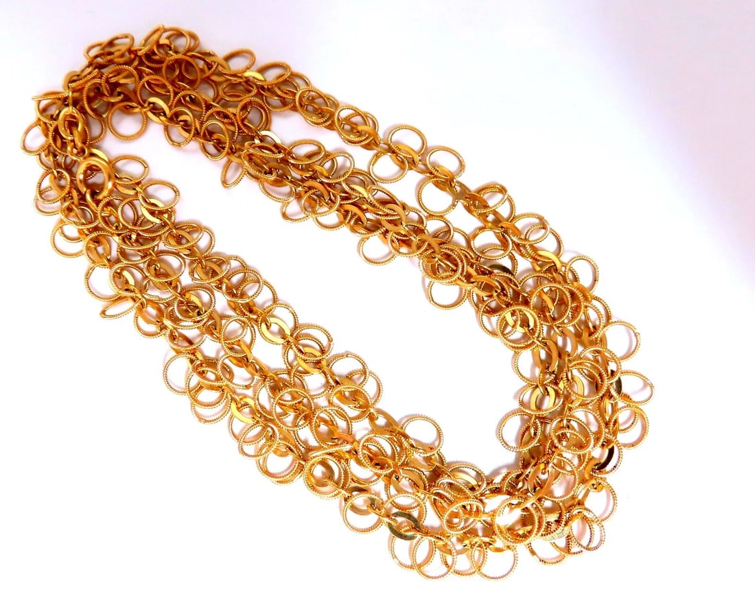 Rolling Rings Necklace 14kt 39 Grams 28inch**: Title: Rolling Rings Necklace 14kt 39 Grams 28inch** Description: MAGNIFICENT JEWELS Rolling Rings Link Necklace 14kt Yellow Gold Weight: 39 Grams 28 inches length. . All Items come with a Free