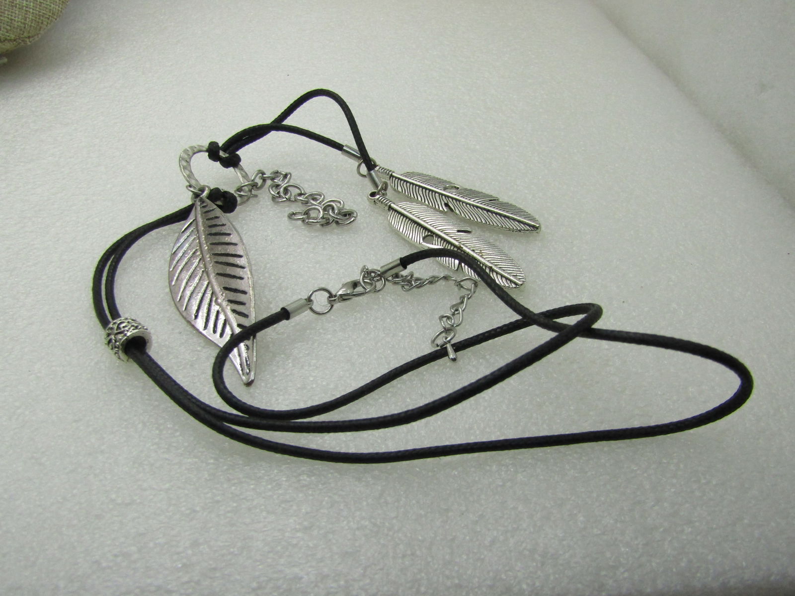 Silver Tone Dangling Feather Necklace, 26", Black Round Cord NL - 5