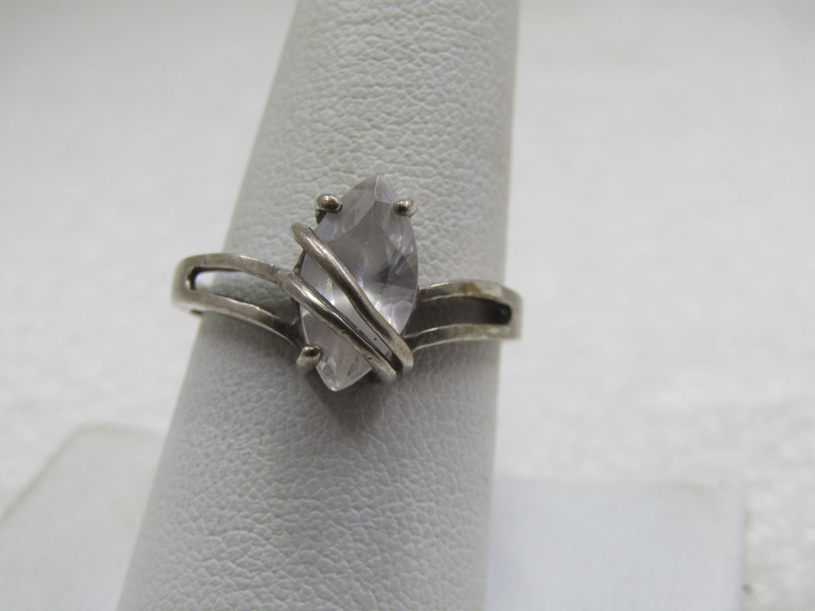 Vintage Sterling Clear Marquise Stone Ring, Sz. 8.5, Signed CA, 1960's-1970's: Vintage Sterling Clear Marquise Stone Ring, Sz. 8.5, Signed CA, 1960's-1970's. 11.5mm by 7m . clear marquise stone, quartz or glass, not sure. It has a double wire-wrap over the stone that crosses at