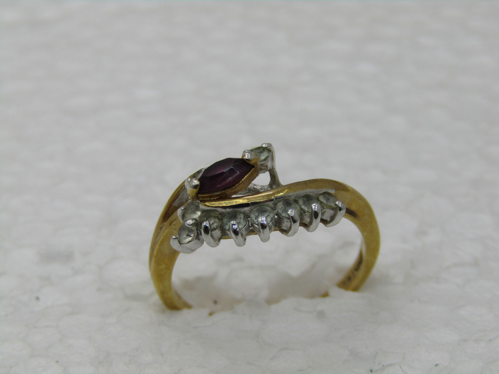 Vintage Maja 14kt GP Bypass Simulated Amethyst & Clear Stone Ring, Sz. 6.5: Vintage Maja 14kt GP Bypass Simulated Amethyst & Clear Stone Ring, Sz. 6.5. 14kt electro plated old ring with 10 clear stones and a single marquise simulated amethyst. Two-tone gold plated, mostly yel