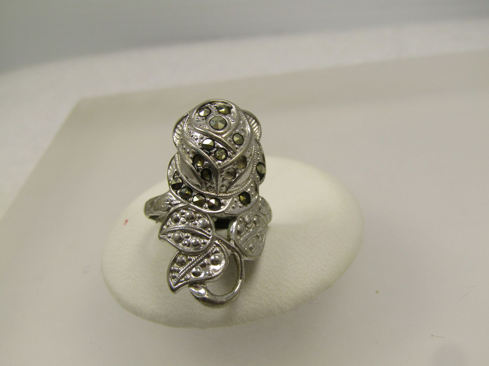 Vintage 14kt G.E.P Marcasite Rose Ring, Sz. 4.5, 1940's: Vintage 14kt G.E.P Marcasite Rose Ring, Sz. 4.5, 1940's, This has a bright 14kt white gold "uni clad) It has marcasites set in a rose stem ring with leaves and curved stem that has both marcasites