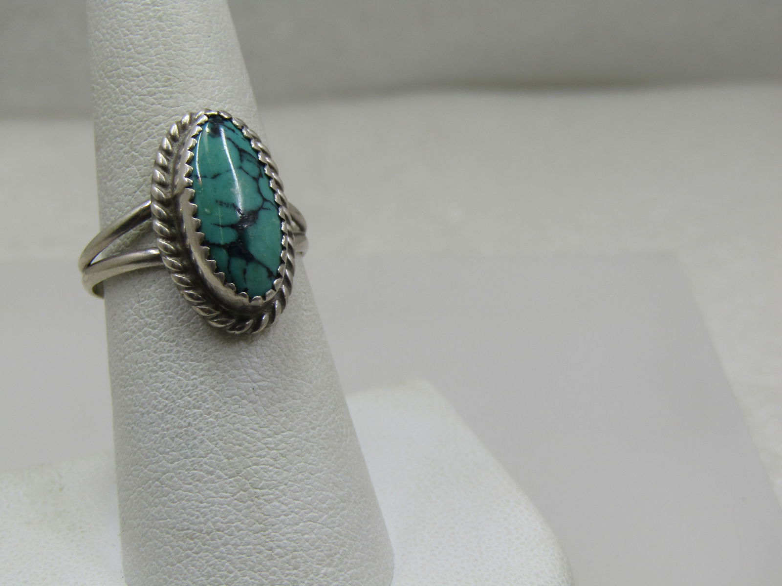 Vintage Sterling Southwestern Turquoise Ring, Signed C.B., Sz. 7.25: Vintage Sterling Southwestern Turquoise Ring, Signed C.B., Sz. 7.25. C.B. Sterling can be Clarence Bailon by research and matching the mark. This has a turquoise stone with black veining. The