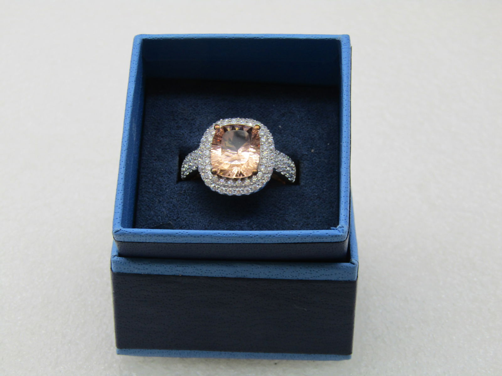 Sterling Rose Gold Peach & Clear CZ Halo Ring, Statement, Sz. 10.5: Sterling Rose Gold Peach & Clear CZ Halo Ring, Statement, Sz. 10.5. Lots of sparkle with a peach or champagne center rectangular CZ that is appx. 12mm by 9.5mm, rounded at the corners. It has a