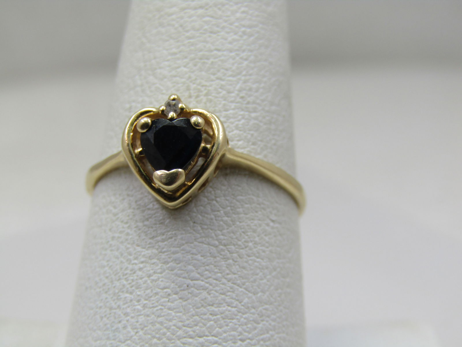 Vintage 14kt Dark Blue Sapphire Heart & Diamond Ring, Sz. 8: Vintage 14kt Dark Blue Sapphire Heart & Diamond Ring, Sz. 8. The stone is so dark it looks black. It does test as sapphire. It is appx. 4.5mm wide and appx. 5mm tall. Testing done in the setting. 