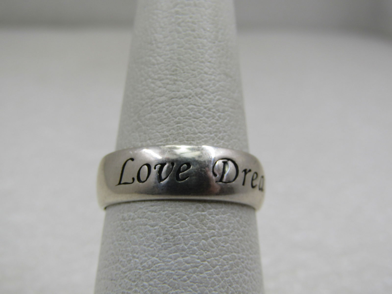 Vintage Sterling Dream Believe Band Ring, Signed RJ, Sz. 7: Vintage Sterling Dream Believe Band Ring, Signed RJ, Sz. 7, Signed RJ for RJ Graziano. The ring is appx. 3.35 grams. Age is post mid-century. Great as a wedding band too. Light wear, very good conditi