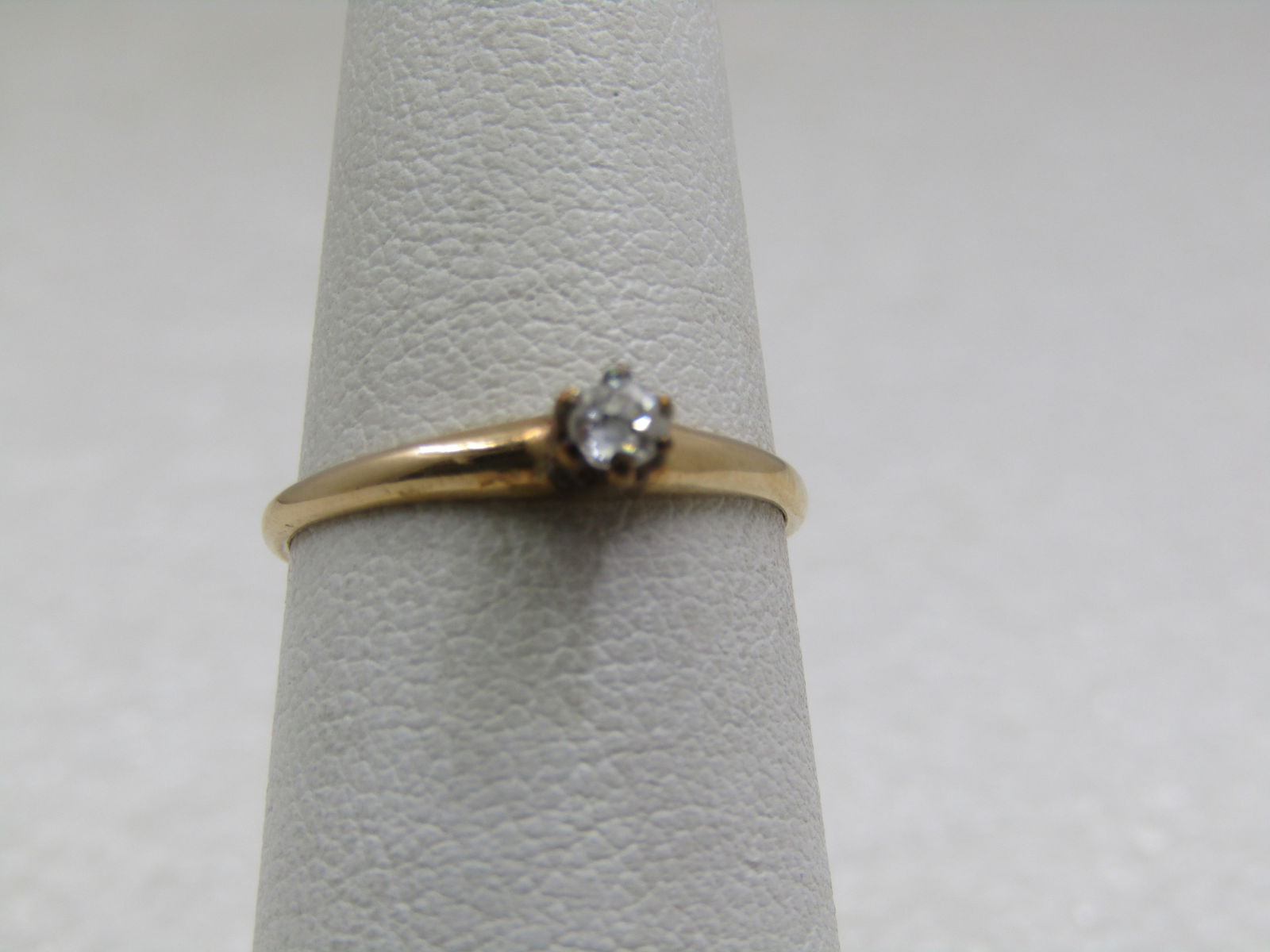 Vintage 14kt Diamond Engagement Promise Ring, Sz. 5.5: Vintage 14kt Diamond Engagement Promise Ring, Sz. 5.5. This has an appx. .10 ctw diamond. There is chipping on the edge which cannot be seen without magnification. The ring is from the late 1800's int