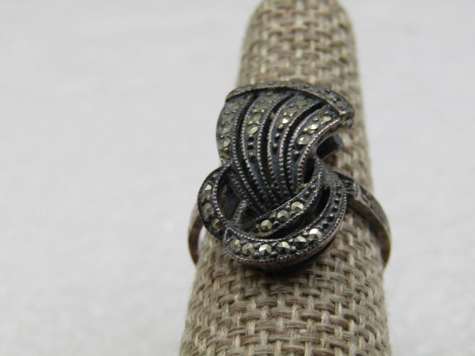Vintage Sterling Marcasite Comet Ring, Sz. 8, Signed J J, Judith Jack, 1960's: Vintage Sterling Marcasite Comet Ring, Sz. 8, Signed J J, Judith Jack, 1960's. The ring has three curved sections with a comet-like tail coming out of the curved circle section with four strands and a