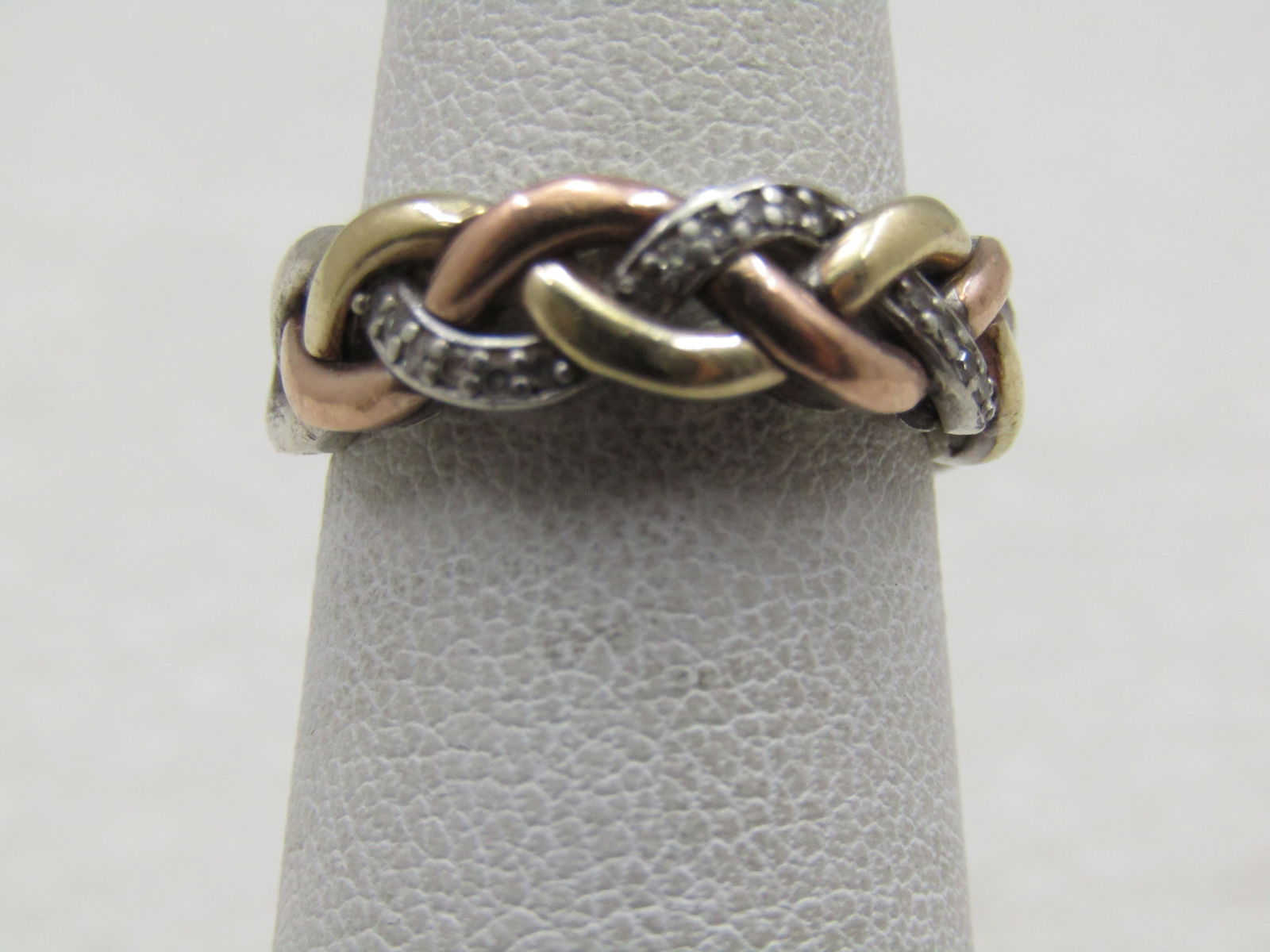 Vintage 10kt & Sterling Braided Diamond Band Ring, Sz. 5: Vintage 10kt & Sterling Braided Diamond Band Ring, Sz. 5 This has a band of sterling, plain, one with diamonds pave set in stgerling and a band of 10kt yellow gold that is not plated but is 10kt gold