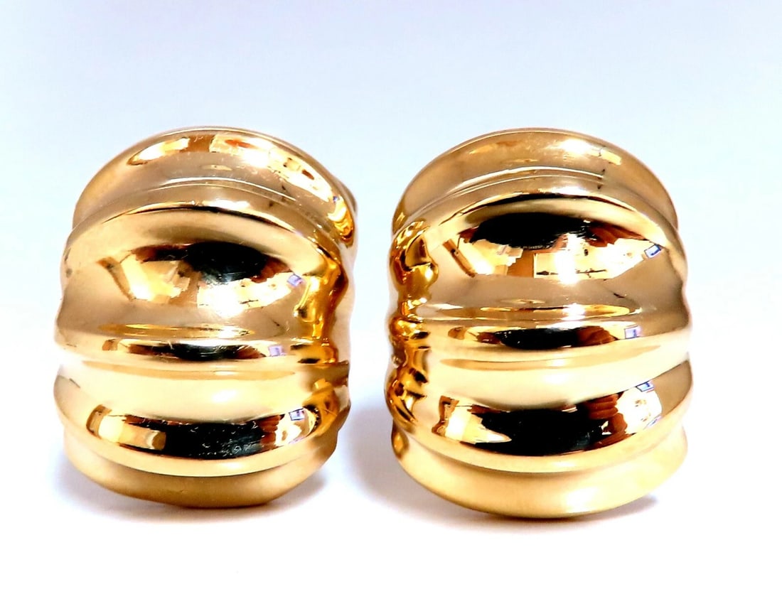 Andrew Clunn 18kt Gold Clip earrings Watermelon Classic**: Title: Andrew Clunn 18kt Gold Clip earrings Watermelon Classic** Description: Designer Andrew Clunn Watermelon Textured Clip Earrings Measurements: 26 x 20mm Depth: 13mm Comfortable Omega Clip 30