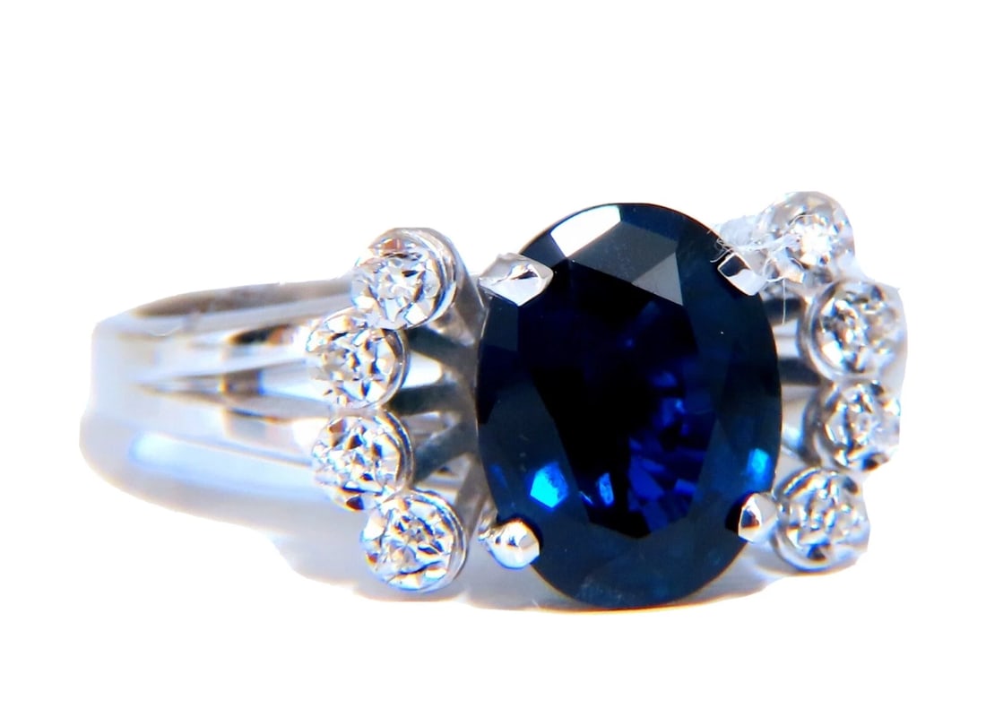GIA Certified 1.89ct Sapphire Diamonds Ring 14kt No Heat: Title: GIA Certified 1.89ct Sapphire Diamonds Ring 14kt No Heat Description: GIA Certified: 1.89ct. Natural blue sapphire ring. Full cut brilliant oval cut Clean clarity Transparent and vibrant top Br