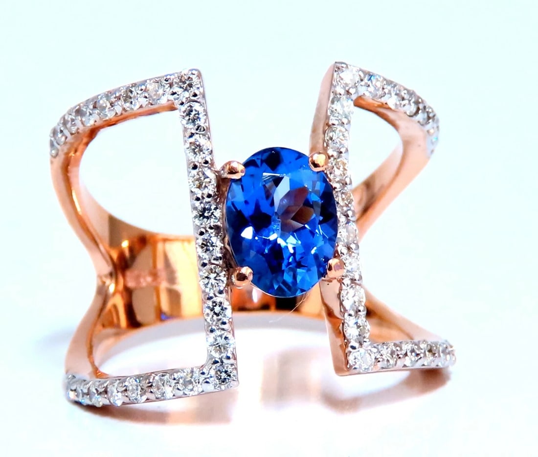1.30ct Natural Tanzanite Diamond ring Wide shoulder Mod**: Title: 1.30ct Natural Tanzanite Diamond ring Wide shoulder Mod** Description: 1.30ct. Tanzanite ring Tanzanite: Full cut brilliant Oval cut Clean clarity Transparent and vibrant top Violet Blue