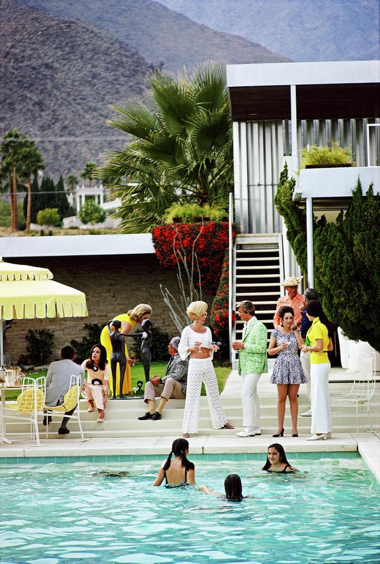 Slim Aarons 'Party on the Steps' 1970 Limited Estate Edition: 1970 (Printed Later): Title: Slim Aarons 'Party on the Steps' 1970 Limited Estate Edition: 1970 (Printed Later) Description: Party on the Steps' Guests by the pool at Nelda Linsk's desert house in Palm Springs,