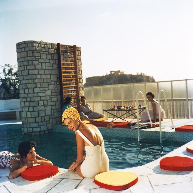 Slim Aarons 'Penthouse Pool' 1961 Official Limited Estate Edition: 1961 (printed later): Title: Slim Aarons 'Penthouse Pool' 1961 Official Limited Estate Edition: 1961 (printed later) Description: Penthouse Pool' Young women by the Canellopoulos penthouse pool, Athens, July 1961. Paper si
