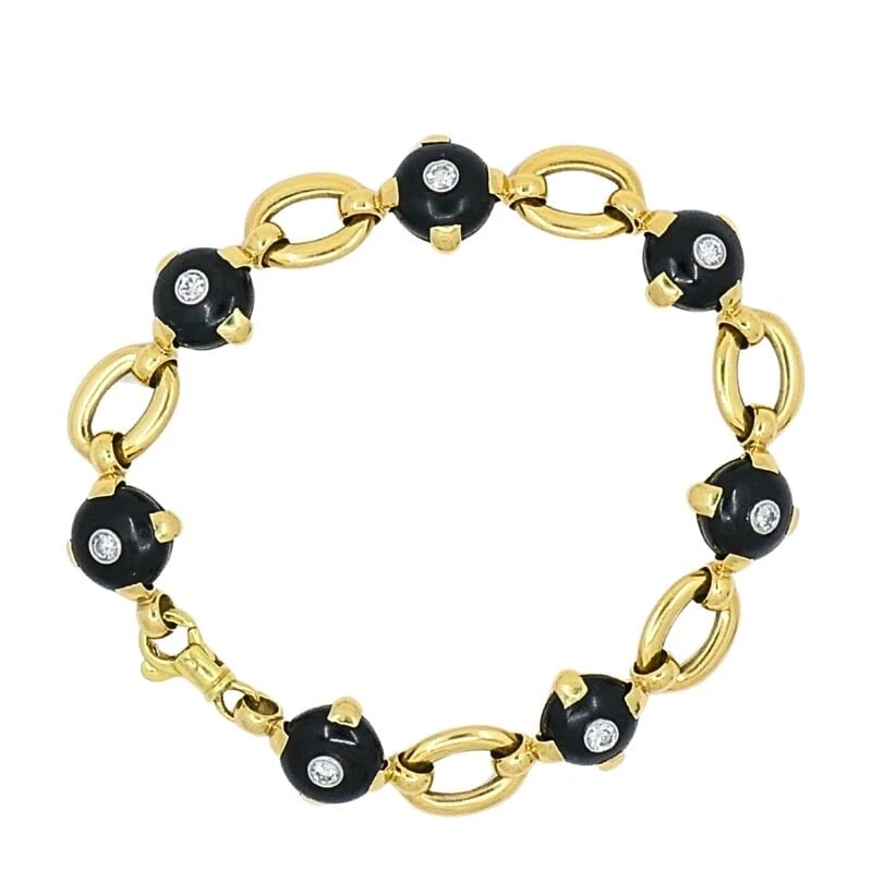 Marzo Paris 18K Gold Onyx Diamond Bracelet: Title: Marzo Paris 18K Gold Onyx Diamond Bracelet Description: Product details: DESNER: Marzo Paris CRCA: 1930’s MATERALS: 18k Yellow old EMSTONE: Onyx, Diamond WEHT: 31.7 rams 