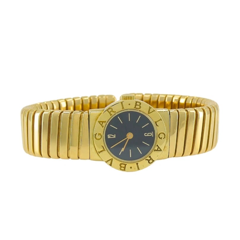 Bvlgari Bulgari Tubogas Gold Watch: Title: Bvlgari Bulgari Tubogas Gold Watch Description: T A Bulgari Tubogas 18k gold watch with the case diameter 19 mm. An iconic Bulgari watch with a classic Tubogas bracelet and a black matte dial.