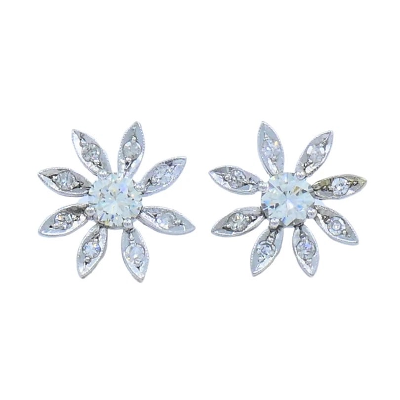 Diamond Floral Stud EARRINGS 14k Gold Estate Jewelry: Title: Diamond Floral Stud EARRINGS 14k Gold Estate Jewelry Description: 14 karat White old Diamond Stud Earrings A pair of diamond floral stud earrings made of 14k gold. Each earring showcases a cent