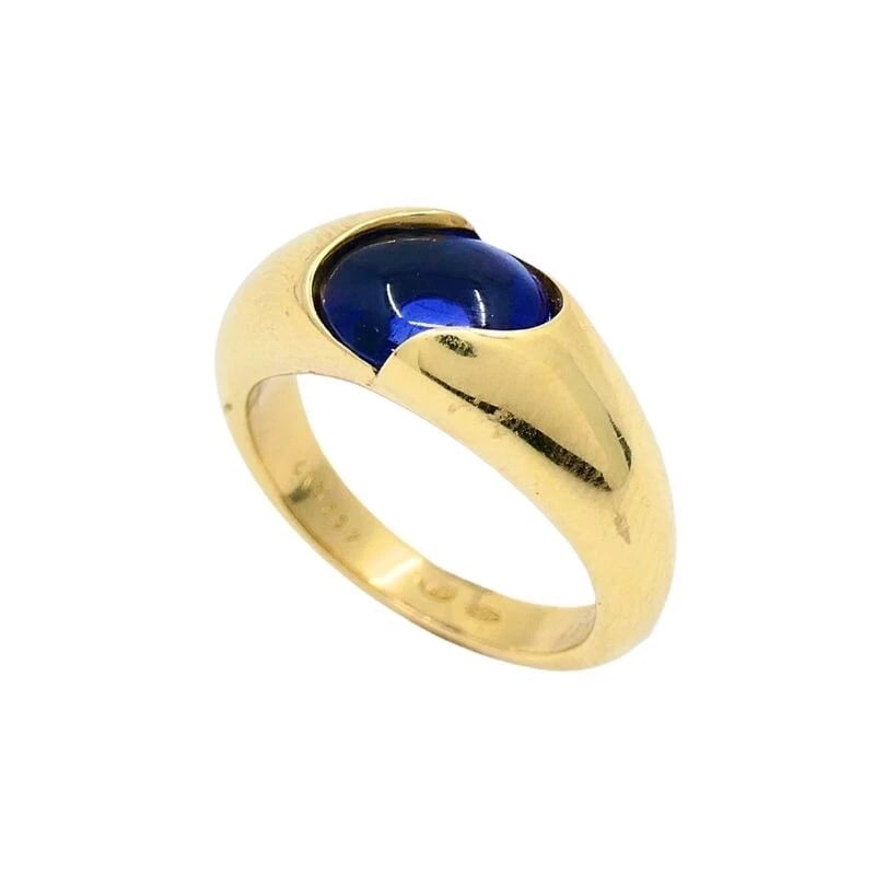 Chaumet Ring Blue Iolite 18k Gold Band: Title: Chaumet Ring Blue Iolite 18k Gold Band Description: ROO Product details: DESNER: Chaumet CRCA: 1990’s MATERALS: 18k Yellow old EMSTONE: olite WEHT: 9.2 grams RN SZE: 6 - 6.25 <b