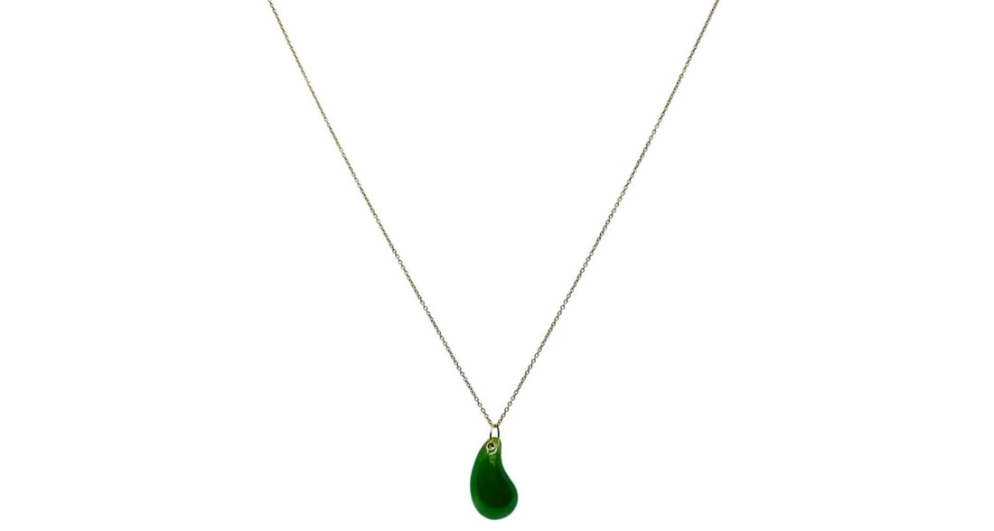 Elsa Peretti for Tiffany & Co. Teardrop Jade Pendant Gold Necklace: Title: Elsa Peretti for Tiffany & Co. Teardrop Jade Pendant Gold Necklace Description: Product details: DESNER: Elsa Peretti for Tiffany & Co. CRCA: 1980’s MATERALS: 18k Yellow old 