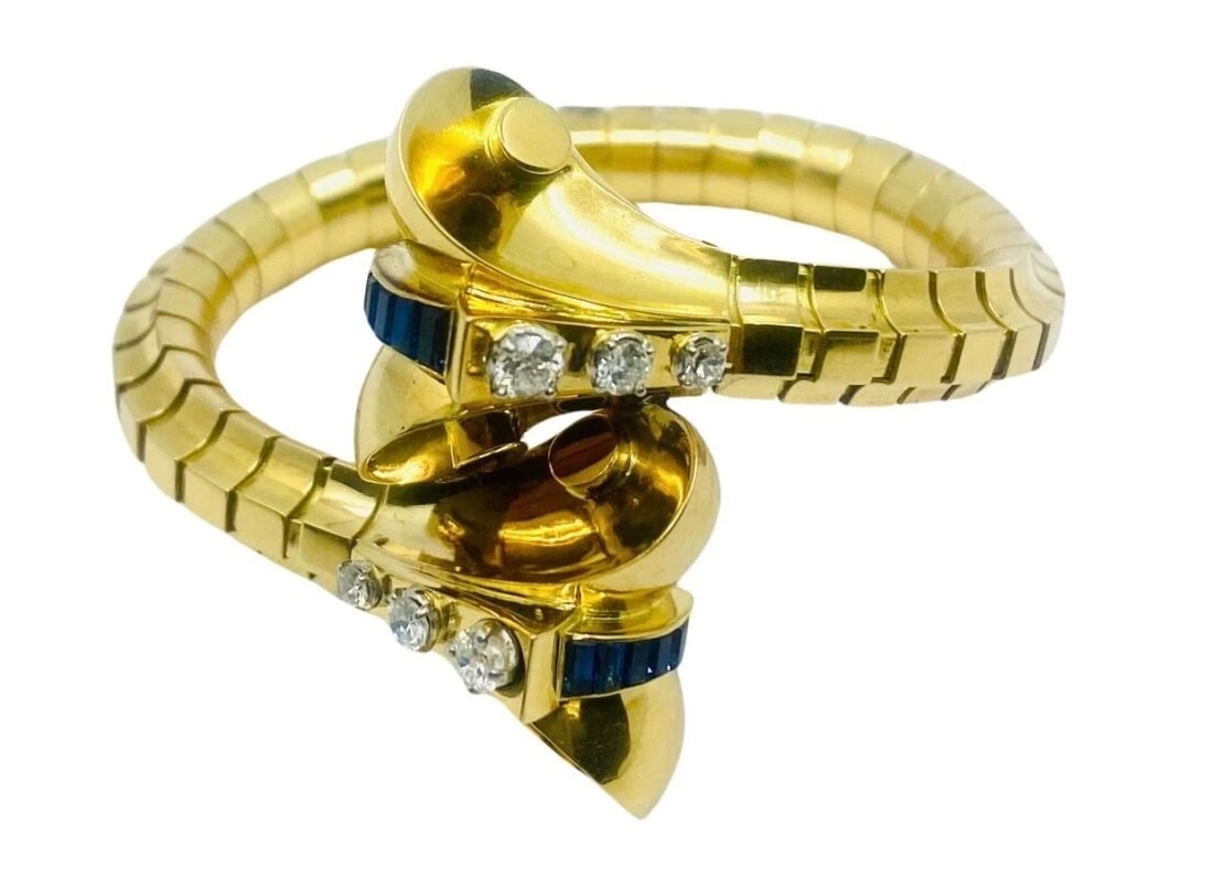 Van Cleef & Arpels Diamond Sapphire Gold Snake Bracelet: Title: Van Cleef & Arpels Diamond Sapphire Gold Snake Bracelet Description: Product details: DESNER: Van Cleef & Arpels CRCA: 1940’s MATERALS: 18k Yellow old EMSTONE: Round Brilliant Cut Diamond