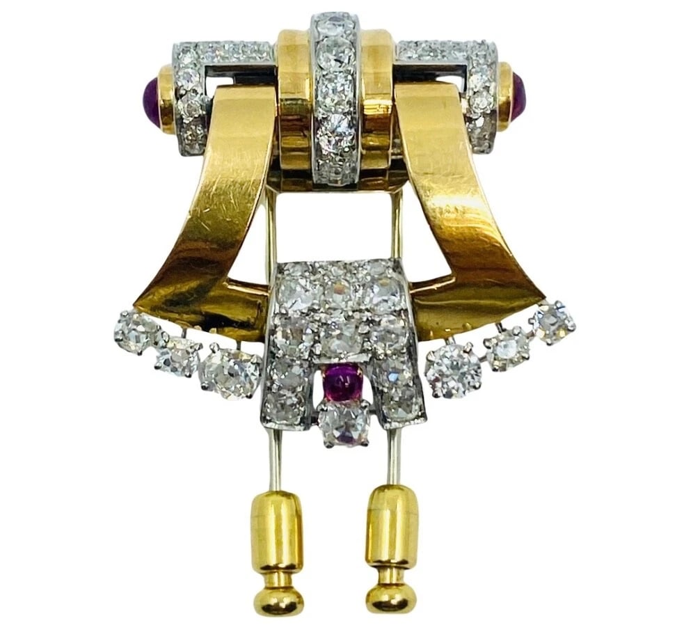 Mellerio Retro Yellow and White 18k Gold Diamond Ruby Brooch: Title: Mellerio Retro Yellow and White 18k Gold Diamond Ruby Brooch Description: Product details: DESNER: Mellerio dits Meller CRCA: 1950’s MATERALS: 18k old EMSTONE: Round Brilliant Cut