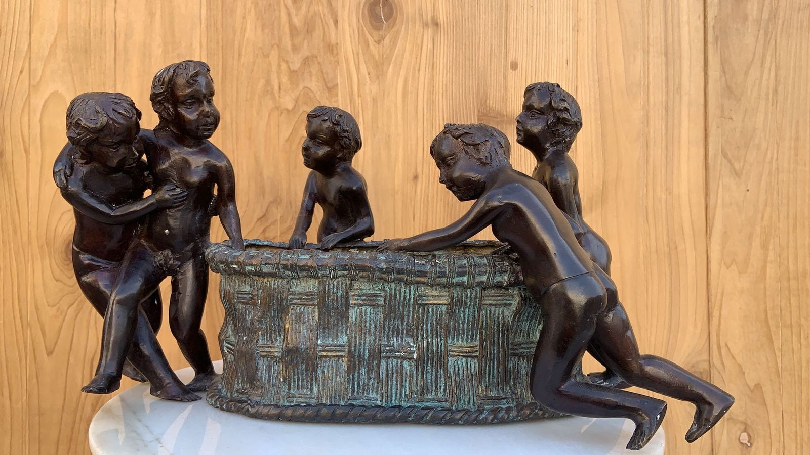 Vintage Figural Bronze Planter by Maitland Smith: Title: Vintage Figural Bronze Planter by Maitland Smith Description: Maitland Smith Bronze Planter with Five Boys A Maitland Smith bronze planter featuring five boys is a distinctive and artistic