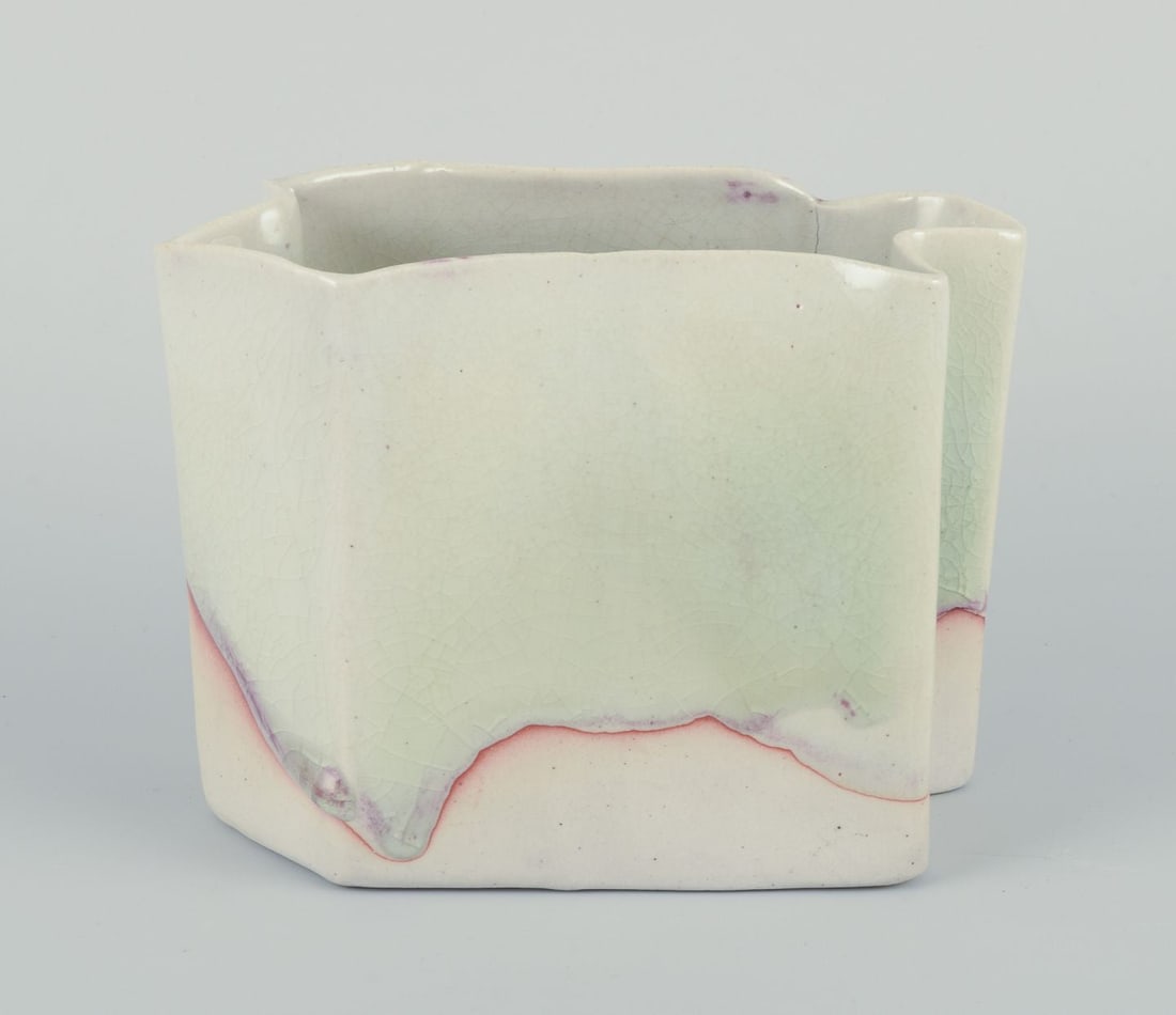 Danish studio ceramicist. Ceramic vase with glaze in light tones. Ca. 1980s. (1 of 9)