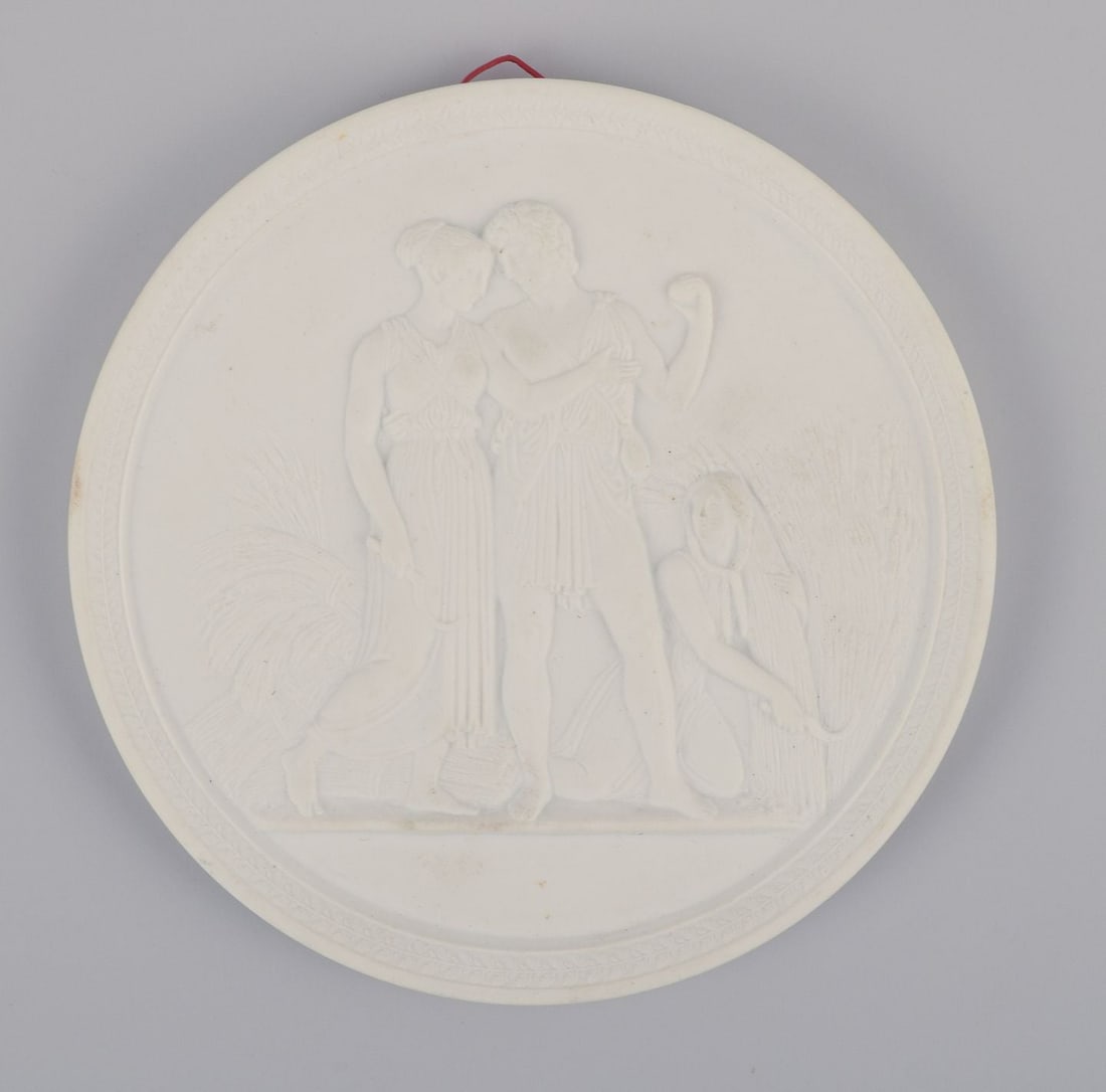 Royal Copenhagen. Three biscuit wall plaques, after motifs by Bertil Thorvaldsen. - 2