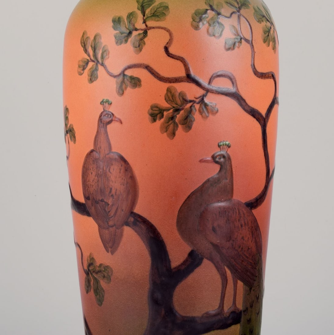 Ipsen's, Denmark. Large table lamp in ceramic. Motif of peacocks sitting in a tree. Approx. 1920 - 2