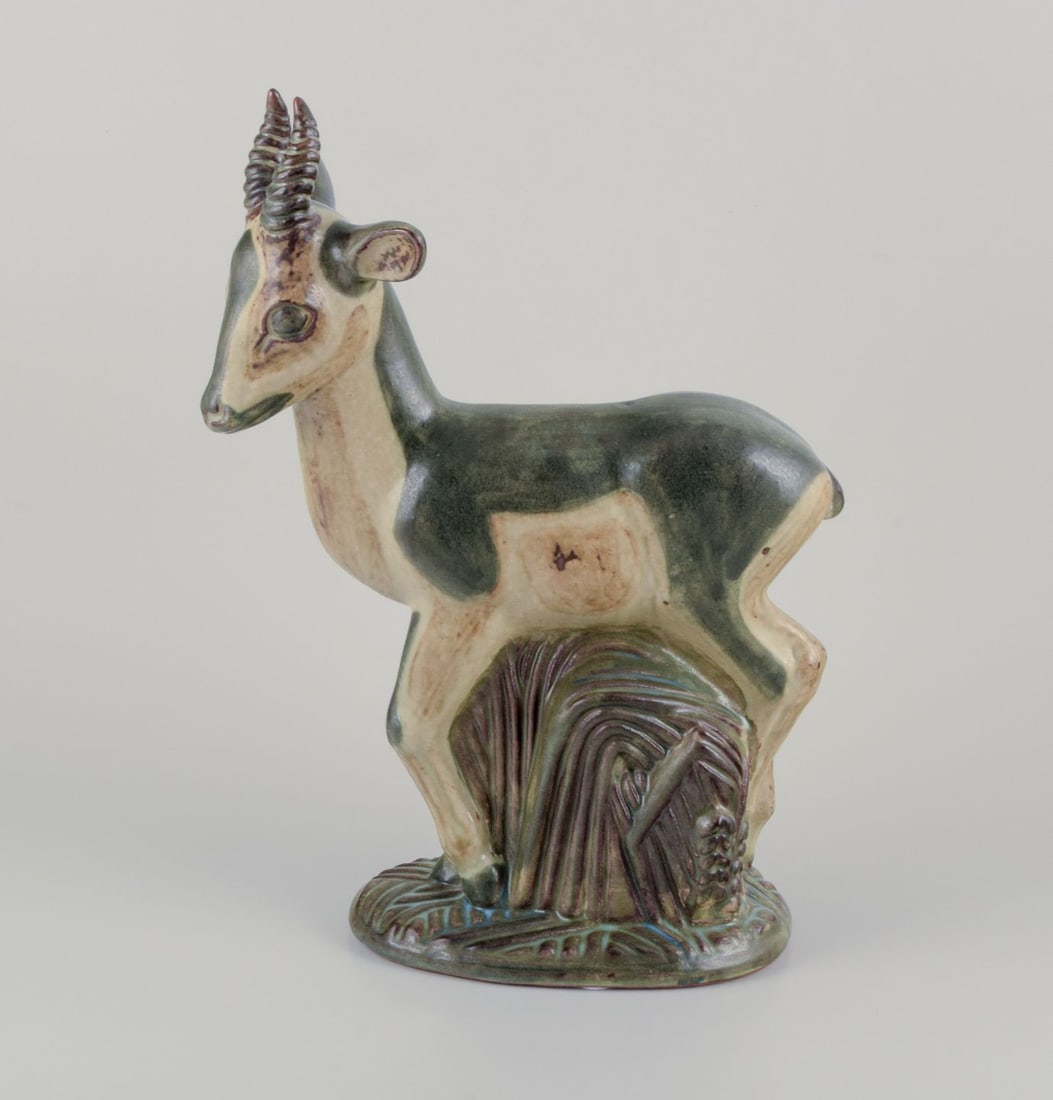 Axel Salto, Royal Copenhagen. Large and impressive ceramic sculpture of a deer. Approx. 1940 - 2