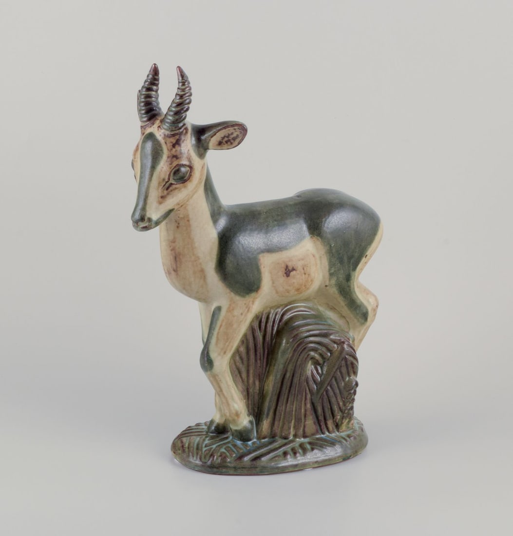 Axel Salto, Royal Copenhagen. Large and impressive ceramic sculpture of a deer. Approx. 1940 - 4