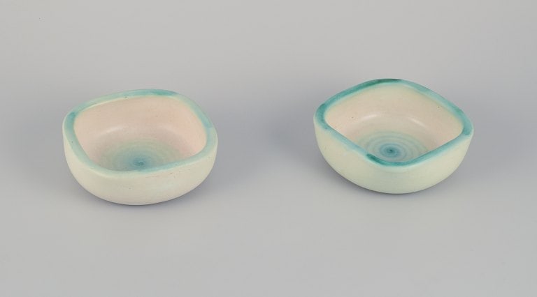 Elchinger, France. Two ceramic bowls with light-toned glaze. Hand-decorated. Spiral-shaped (1 of 9)
