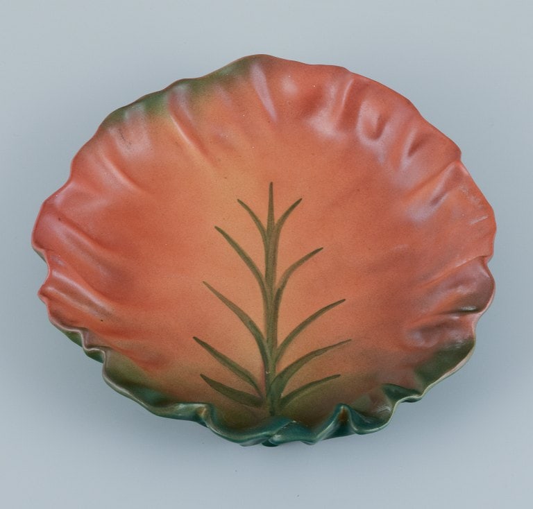 Ipsens Enke, Denmark. Ceramic bowl with wavy rim. Design depicting plant growth. Glaze in orange and (1 of 7)