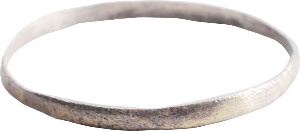 VIKING WOMAN’S WEDDING RING, 850-1050 AD: Gilt bronze. Rare large size 13 ¼. 1.7mm rounded face band. Crisp with surface texture from burial. Professionally refurbished with the pure silver overlay restored. Jewelry gift boxed with a cer