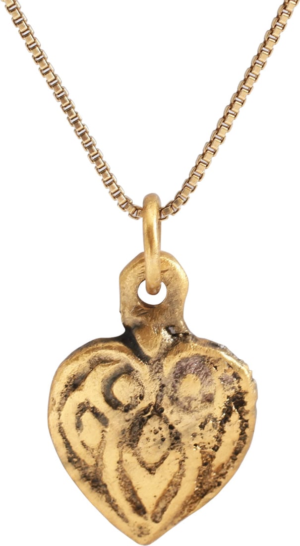 RARE ANCIENT VIKING HEART PENDANT NECKLACE, C.850-1050 AD: Classic heart form. Just under 5/8" height plus the suspension loop. Made by the open face mold technique 1000 years ago! Central high domed heart in its fully evolved form with cusped top and raised