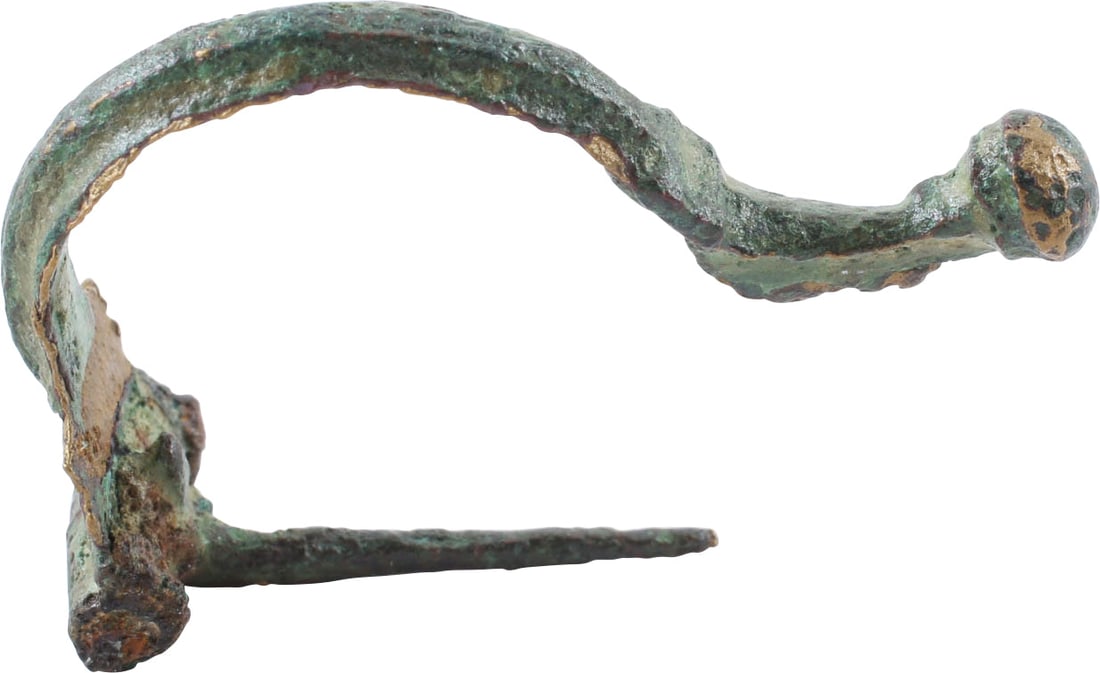 GREEK BROOCH, FIBULA, 2ND CENTURY BC: The original garment pin was patented two millennia later as the " safety pin" . Bow fibula, bronze, over 1 3/4" length, of high ribbed arch form with nub finial. Surface lightly encrusted from burial