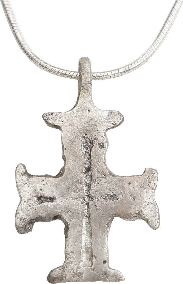 MEDIEVAL PILGRIM'S CROSS, 14TH-15TH CENTURY AD: Silvered bronze, just over 1" in height. The Lorraine cross, symmetrical with expansions (" crutches") to the beam terminals, specifically related to the Crusader's pendants bearing the Jerusalem cros