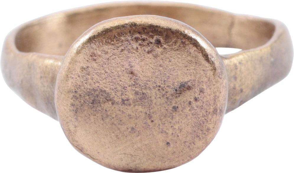 RENAISSANCE PERIOD MAN’S EUROPEAN RING, 14TH-16TH CENTURY, SIZE 11 1/2: Large example, gilt bronze, rounded face band .7mm medial width flared to the shoulders and bottom at 5.2mm. Raised oval bezel with remnants of a n inscribed figure, evidently a cross. See Ancient Rin