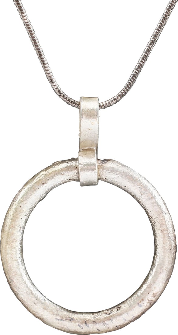 CELTIC PROSPERITY RING NECKLACE, C.300-100 BC.: Before the Roman invasion of the British Isles, rings of bronze, silver, and gold were used as a means of exchange, particularly in Ireland. Most exchanges of goods and property were conducted by bart