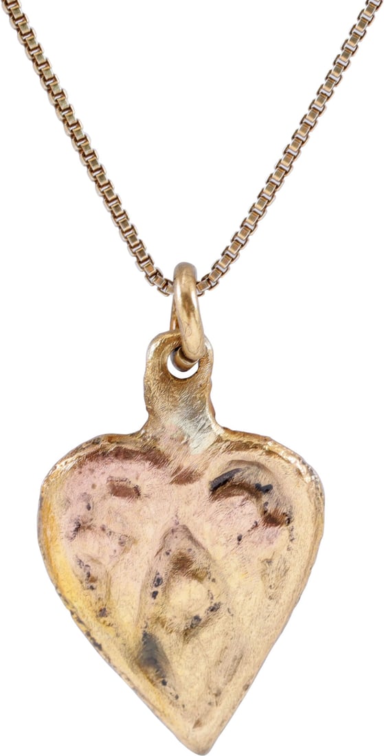 RARE ANCIENT VIKING HEART PENDANT NECKLACE, C.850-1050 AD: Classic heart form. Slightly over 3/4" (0.77”) height plus the suspension loop. Made by the lost wax process. Broad border terminating in foliate elements within the field flanking a dot and