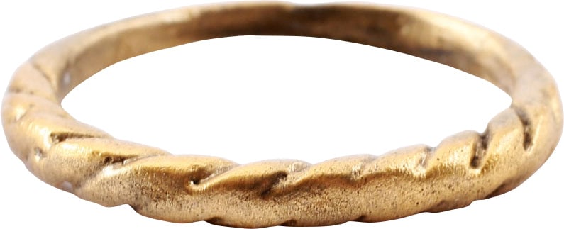 VIKING ROPED OR TWIST WEDDING RING, 866-1067 AD, SIZE 11 ¼: Cambridgeshire, England, 866-1067 AD. Oval form, size 11 1/4. 1.9mm at the bottom swelling to 2.tmm at the top. Well modeled roped motif producing a crest. The spiral or helix was a favorite Viking
