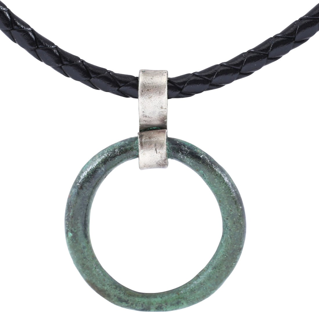 CELTIC PROSPERITY RING NECKLACE, C.400-100 BC.: Before the Roman invasion of the British Isles, rings of bronze, silver, and gold were used as a means of exchange, particularly in Ireland. Most exchanges of goods and property were conducted by bart