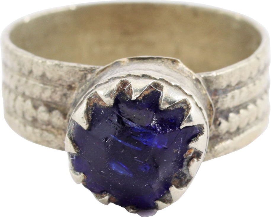 EASTERN EUROPEAN GYPSY RING, SIZE 8 1/2: Good quality white metal band, 6.3mm width in four rope bands. Integral cylindrical bezel with beaded waist and blue “stone”. Early example, probably mid 19th century. Some wear including