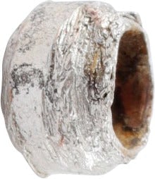 VIKING SILVERED BEAD, 9TH-11TH CENTURY AD: Silvered bronze, about 6.0mm in diameter and 4.2mm in length. Originally strung with the tubular pendant as part of an elaborate aegis or pectoral. Professionally refurbished with the silver surface r