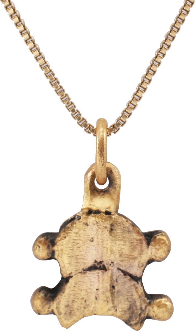 MEDIEVAL FRENCH PENDANT 14th-15th CENTURY: Gilt bronze. Heraldic motif, made for a noble. Under 1/2" height in two ranks of inverted chevron form flanked by curved lugs. That probably symbolizes a valiant forebear who fought successfully again