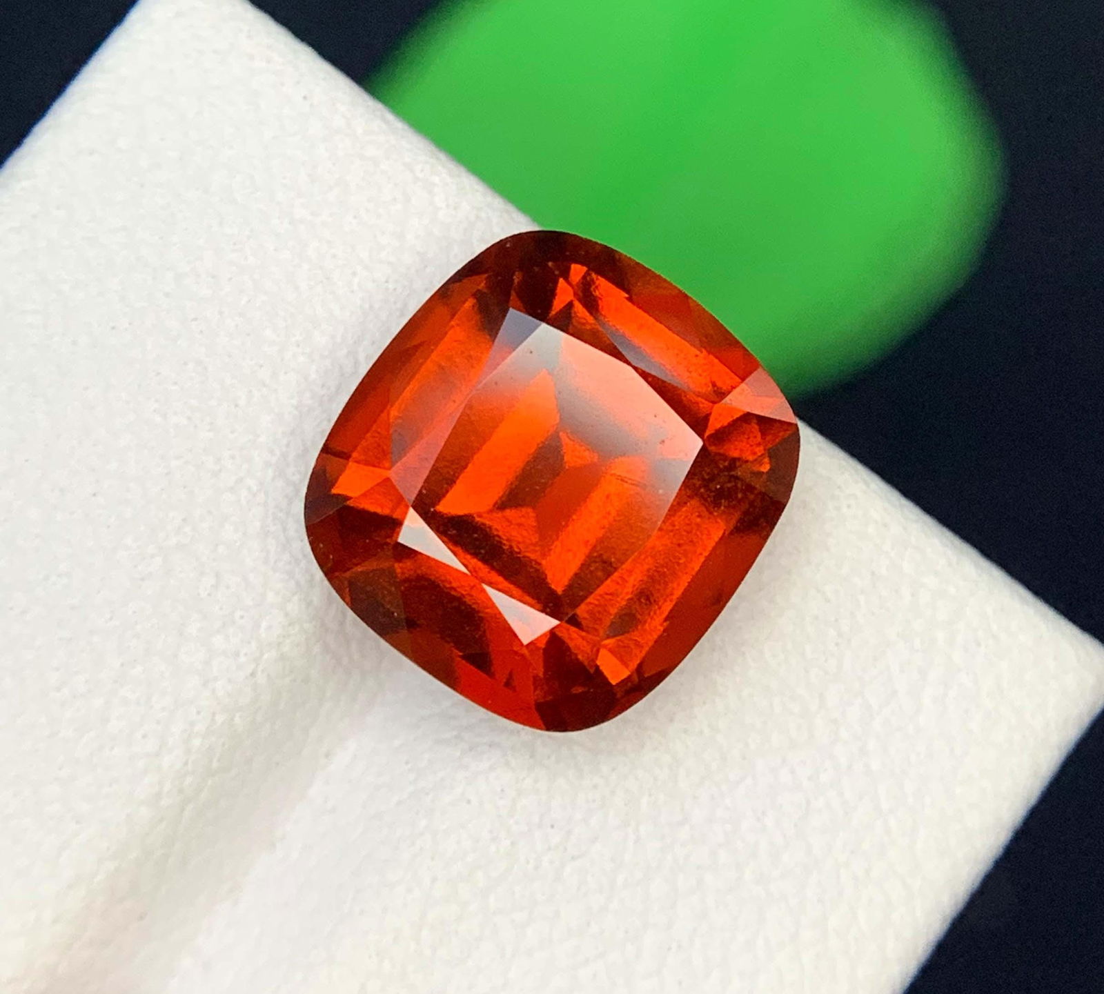 Reddish Orange Garnet Gemstone: Natural January Birthstone, Mozambique (7.87 Carat): Materials: Gemstone: Garnet Carat weight: 7.87 Natural Garnet Gemstones, Reddish Orange Color Garnet Loose Gemstones January Birthstone Weight : 7.87 Carats Size : 12*11*6.5 mm Cut : Cushion Color