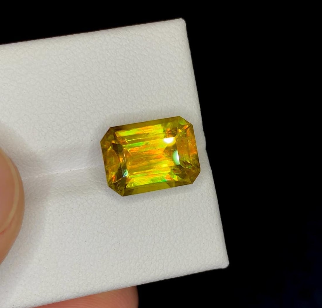 Lustrous Yellow Sphene Gemstone: Emerald Cut, June Birthstone, 6.20 Carat: Materials: Gemstone: Sphene Carat weight: 6.20 Natural Sphene Titanite Gemstone, Full Fire Lustrous Sphene Fancy Emerald Shape, for Ring, June Birthstone Weight : 6.20 cts Dimensions : 11.3*8.2*6.2 mm